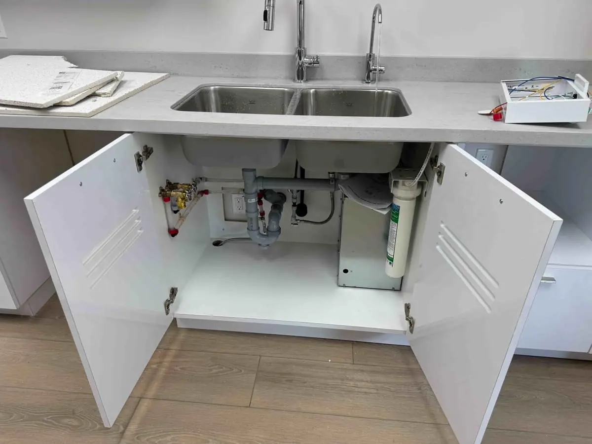 Licensed plumber fixing pipes — Quick Plumbing & Drain Newmarket